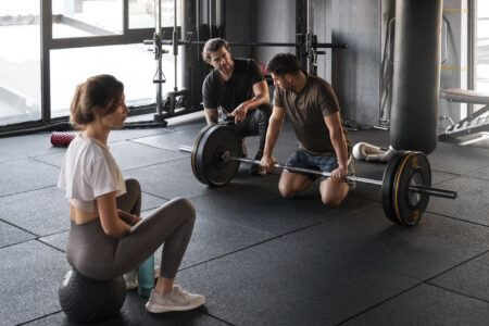 full shot people training together gym